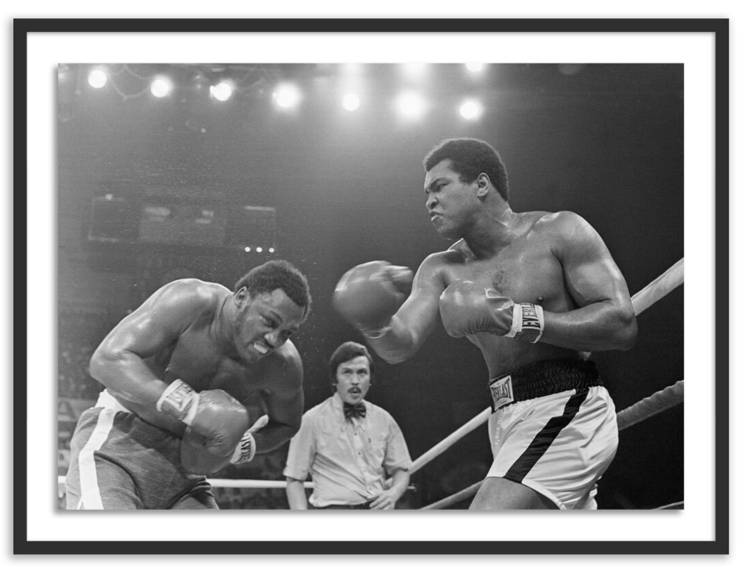 Muhammad Ali Punching Joe Frazier